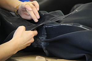 Close-up of seam repair on a military drysuit