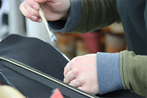 Close-up of zipper replacement on a military drysuit